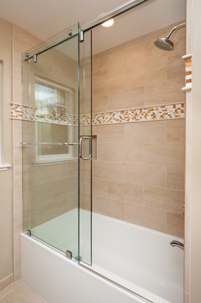 Design ideas for a medium sized classic shower room bathroom in San Francisco with a submerged sink, light wood cabinets, quartz worktops, a built-in bath, a shower/bath combination, a one-piece toilet, beige tiles, porcelain tiles, beige walls, porcelain flooring, recessed-panel cabinets, beige floors and a hinged door.