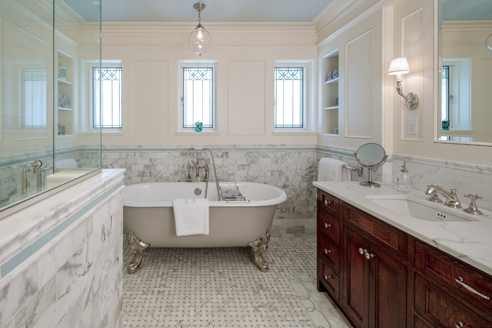 Example of a large classic master stone tile, gray tile and white tile marble floor bathroom design in Minneapolis with an undermount sink, marble countertops, white walls, dark wood cabinets and recessed-panel cabinets