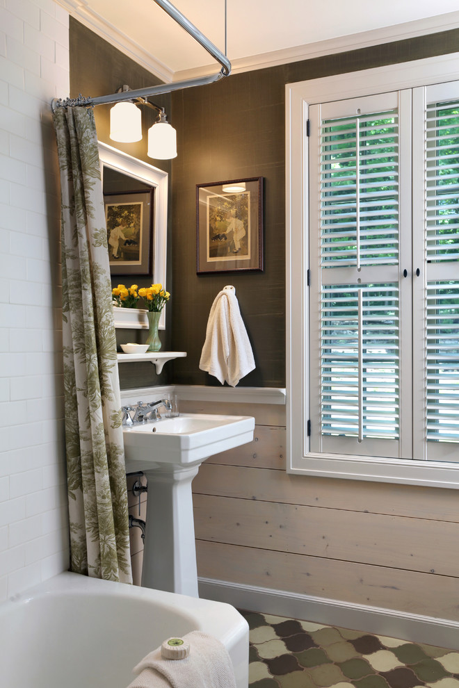 Photo of a farmhouse bathroom in Grand Rapids with a submerged sink, a corner bath, a shower/bath combination, a two-piece toilet, green tiles, terracotta tiles, green walls and terracotta flooring.