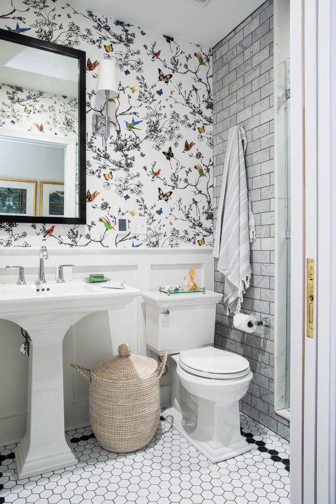 Elegant gray tile and subway tile mosaic tile floor and white floor alcove shower photo in Other with white walls and a pedestal sink
