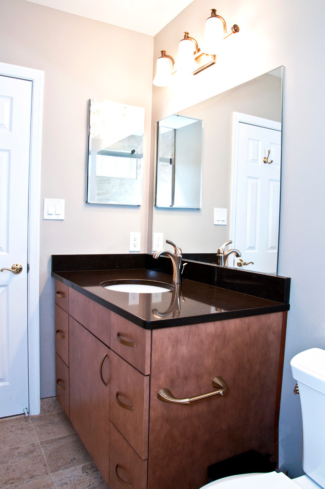 Mid-sized trendy master beige tile and mosaic tile ceramic tile bathroom photo in DC Metro with flat-panel cabinets, medium tone wood cabinets, a one-piece toilet, gray walls, an undermount sink and quartz countertops