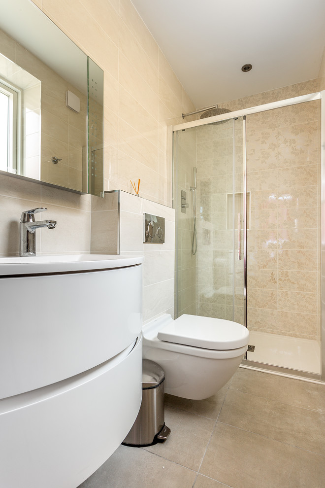 Modern bathroom in London with white cabinets, beige tiles, porcelain tiles, porcelain flooring, a vessel sink, beige floors and white worktops.