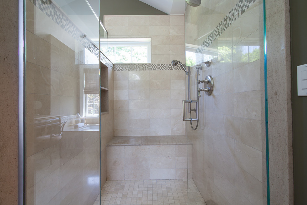 Example of a transitional master beige tile and porcelain tile porcelain tile corner shower design in New York with an undermount tub and beige walls