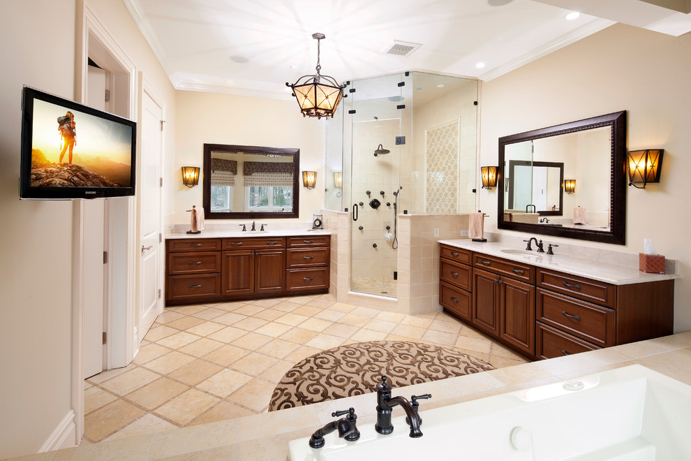 Bathroom - mid-sized traditional master beige tile and ceramic tile ceramic tile bathroom idea in Newark with an undermount sink, beaded inset cabinets, medium tone wood cabinets, marble countertops, a one-piece toilet and beige walls