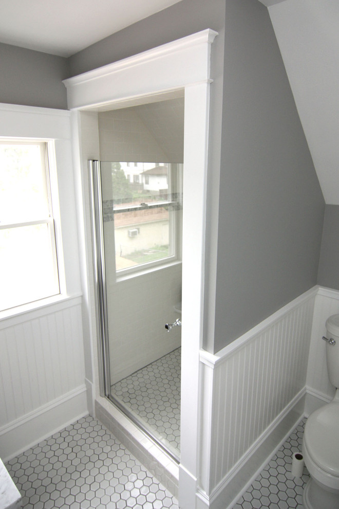 Example of a small classic master white tile and subway tile cement tile floor bathroom design in Minneapolis with a two-piece toilet