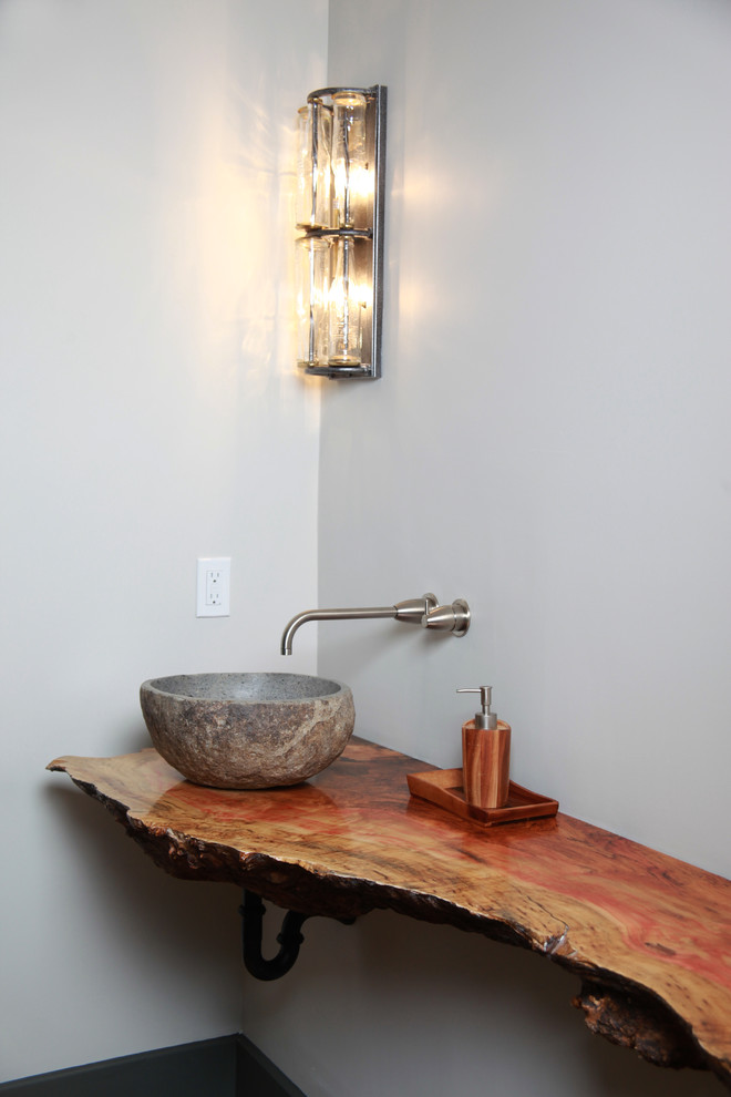 Design ideas for a medium sized rustic cloakroom in Toronto with wooden worktops, freestanding cabinets, distressed cabinets, mosaic tile flooring and orange floors.