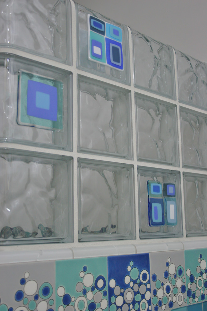 Fused glass tile block wall in a bathroom remodel in Fresno California
