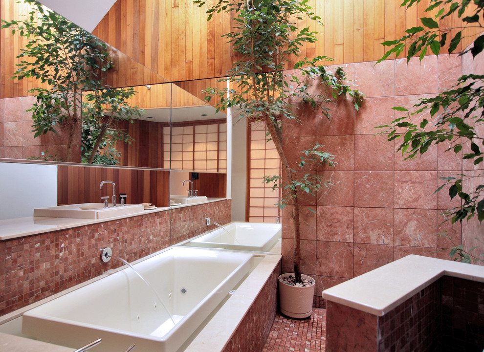 Example of a zen bathroom design in Bridgeport with a vessel sink