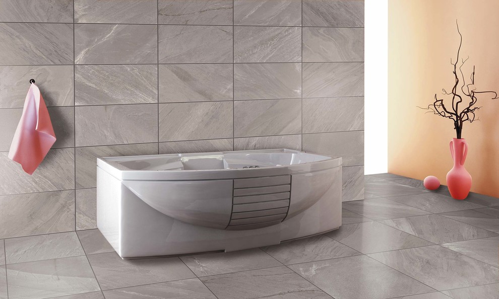 Inspiration for a medium sized contemporary ensuite bathroom in Raleigh with a japanese bath, grey tiles, porcelain tiles, white walls and porcelain flooring.