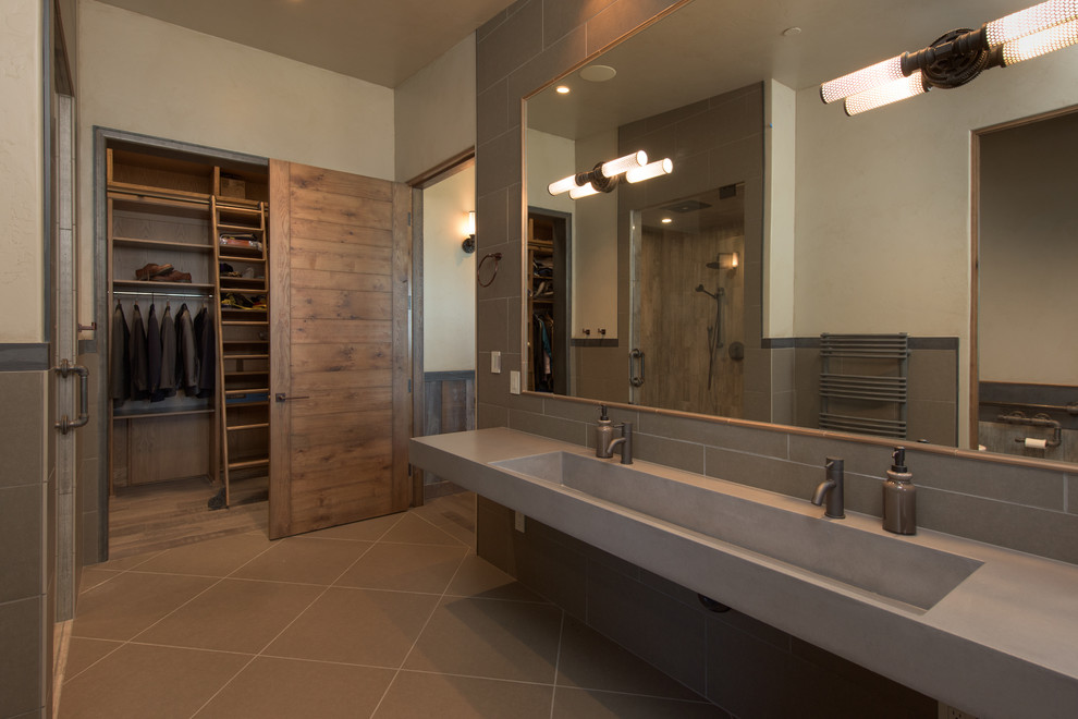 Mid-sized urban master gray tile and porcelain tile porcelain tile and gray floor wet room photo in Sacramento with beige walls, an integrated sink, quartz countertops, a hinged shower door and open cabinets