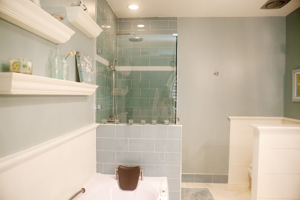 This is an example of a medium sized rural shower room bathroom in Atlanta with white cabinets, an alcove bath, a corner shower, blue tiles, metro tiles, blue walls and limestone flooring.