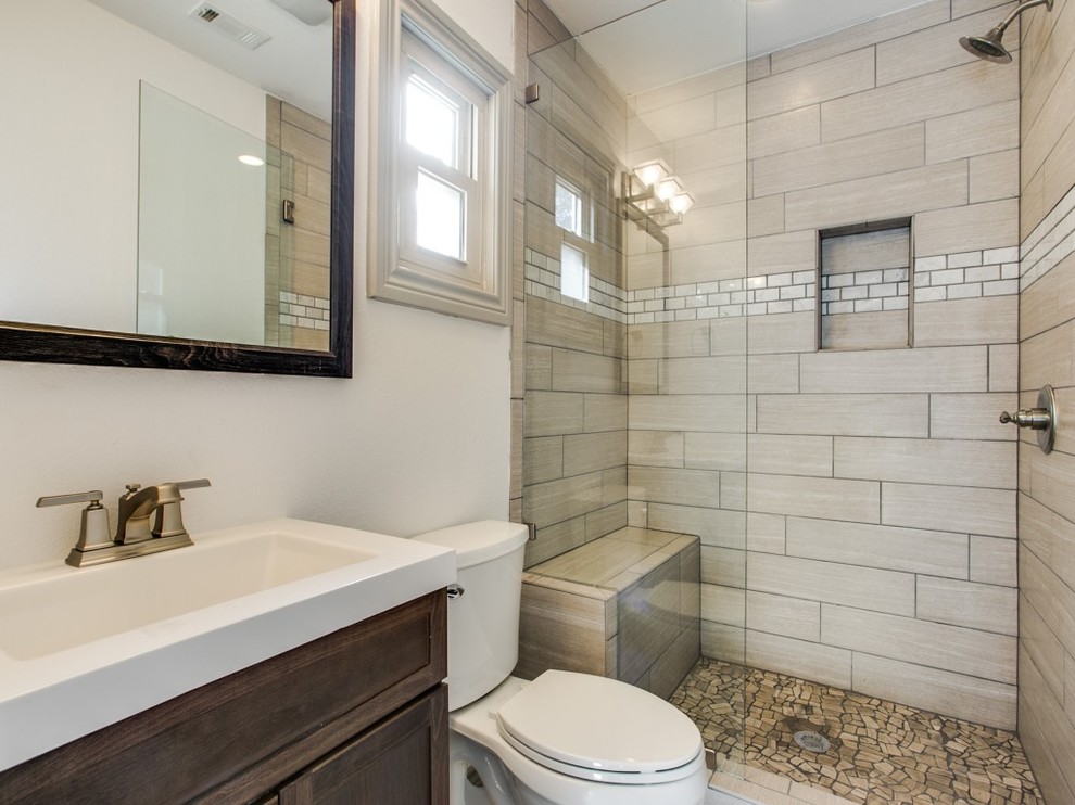 Mid-sized farmhouse 3/4 beige tile and porcelain tile bathroom photo in Dallas with shaker cabinets, dark wood cabinets, a one-piece toilet, white walls, an integrated sink and soapstone countertops
