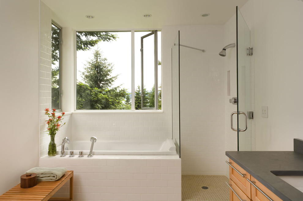 Photo of a modern bathroom in Seattle with shaker cabinets.