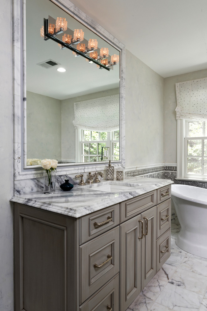 Large transitional master gray tile and mosaic tile marble floor and white floor bathroom photo in DC Metro with shaker cabinets, gray cabinets, a bidet, gray walls, an undermount sink and marble countertops