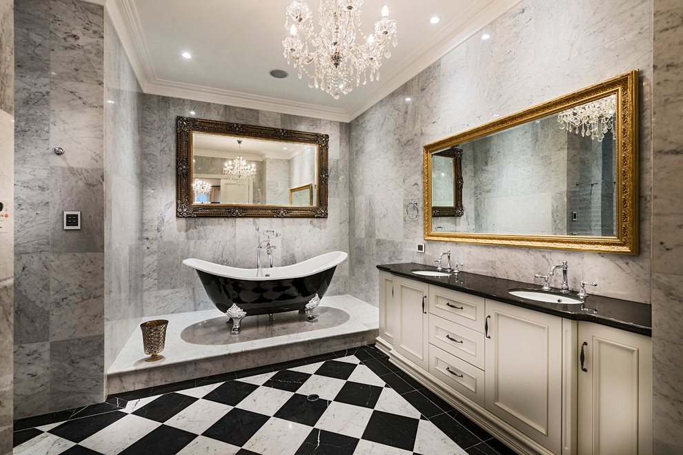 Foto de cuarto de baño clásico con lavabo bajoencimera y suelo multicolor