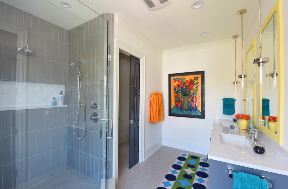 Design ideas for a large contemporary ensuite bathroom in Columbus with blue cabinets, an alcove shower, a submerged sink, quartz worktops, a hinged door, white worktops, flat-panel cabinets, dark hardwood flooring and brown floors.