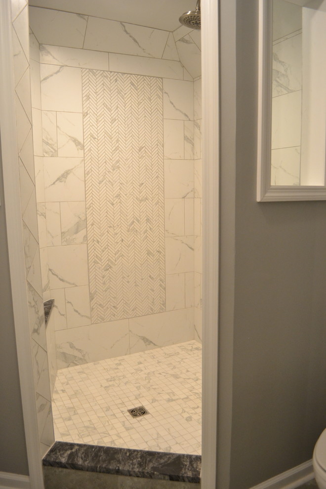 Photo of a medium sized traditional shower room bathroom in Other with flat-panel cabinets, distressed cabinets, a corner shower, a two-piece toilet, grey walls, ceramic flooring, a submerged sink, soapstone worktops, grey floors, an open shower and black worktops.