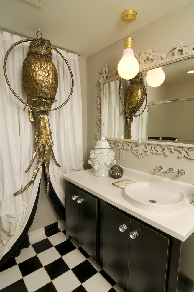 Photo of an eclectic cream and black bathroom in Minneapolis with a vessel sink.