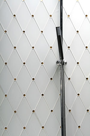 Example of a trendy brown tile and white tile bathroom design in Los Angeles