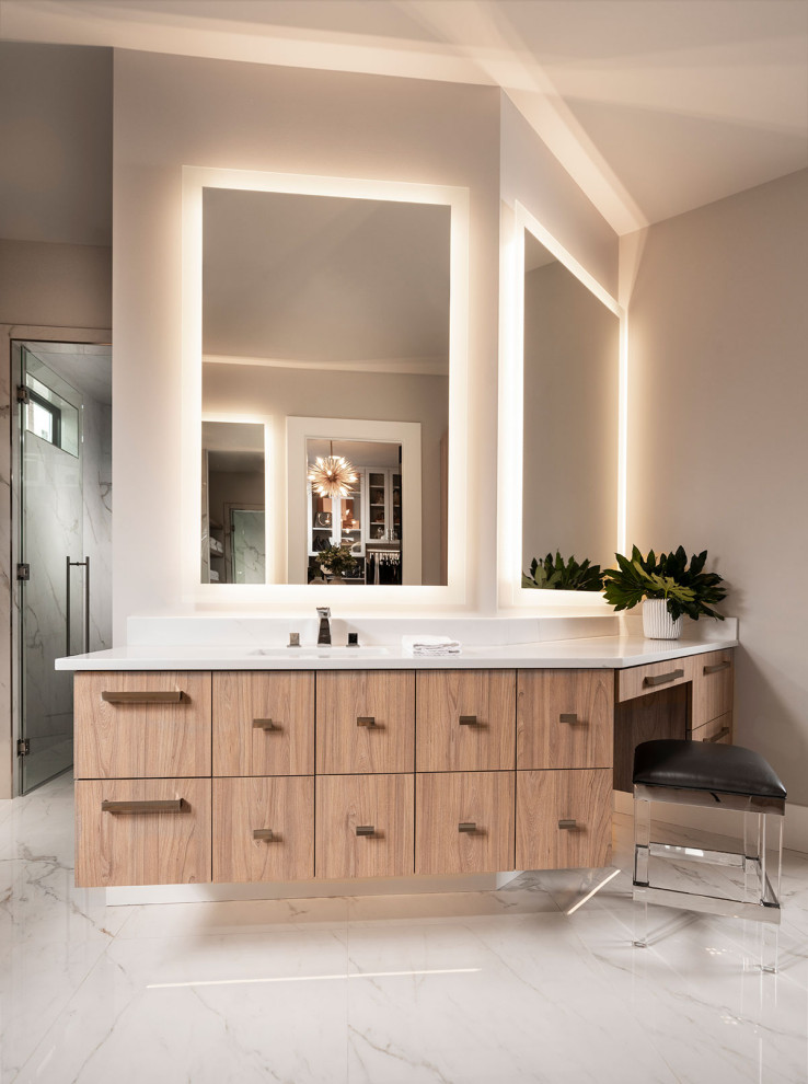 Design ideas for a large modern ensuite bathroom in Other with flat-panel cabinets, light wood cabinets, a freestanding bath, an alcove shower, a bidet, white tiles, marble tiles, grey walls, marble flooring, a submerged sink, engineered stone worktops, white floors, a hinged door, white worktops, an enclosed toilet, double sinks and a floating vanity unit.
