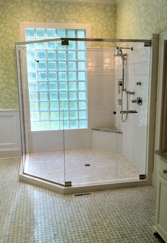 This is an example of a large modern ensuite bathroom in Raleigh with a corner shower, white tiles, ceramic tiles, green walls and ceramic flooring.