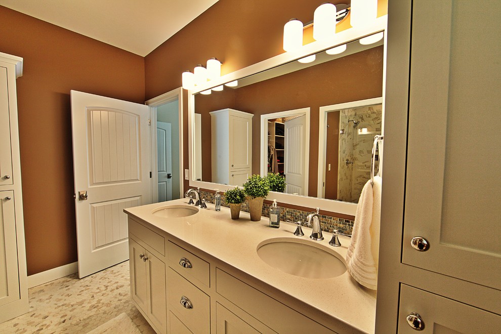 Example of a master multicolored tile and glass tile ceramic tile bathroom design in Grand Rapids with a wall-mount sink, shaker cabinets, white cabinets, quartz countertops and orange walls
