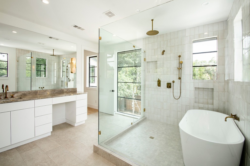 Inspiration for a large modern ensuite wet room bathroom in Dallas with open cabinets, medium wood cabinets, a freestanding bath, a two-piece toilet, beige tiles, ceramic tiles, white walls, porcelain flooring, a submerged sink, quartz worktops, beige floors, a hinged door and multi-coloured worktops.