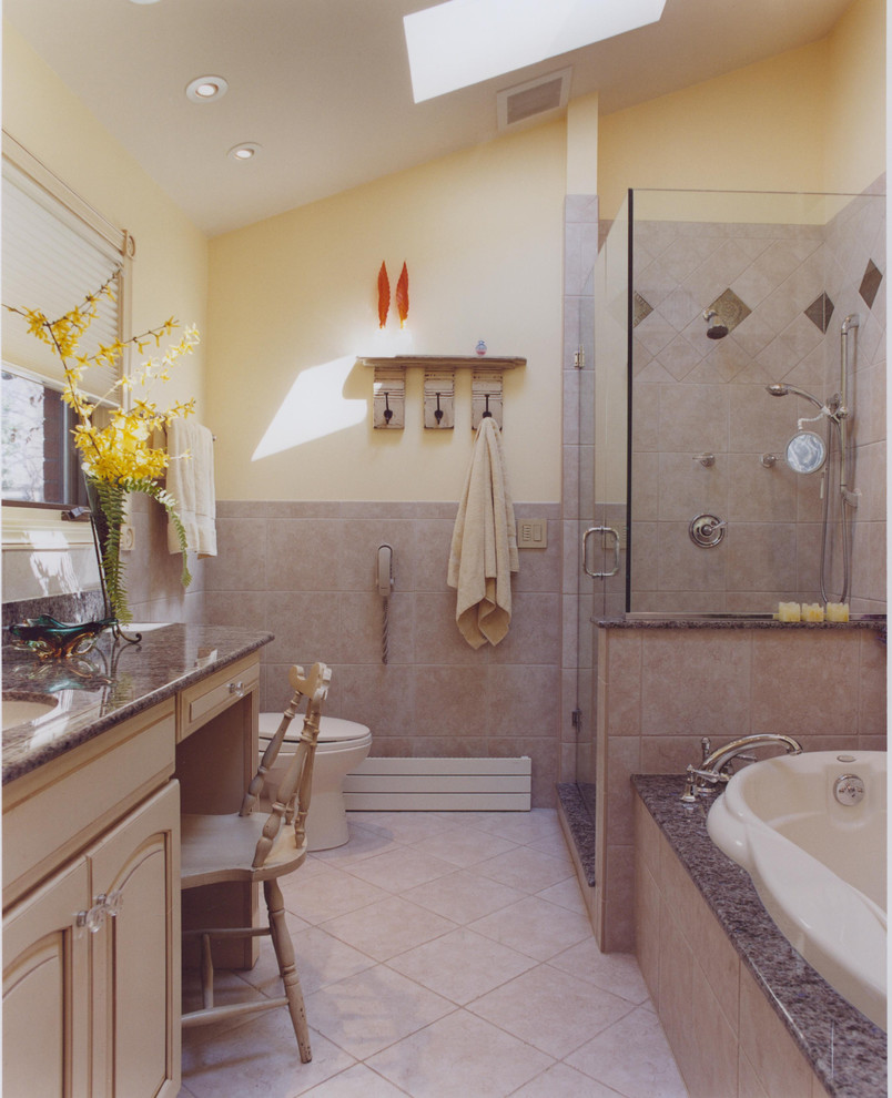 Mid-sized minimalist beige tile and porcelain tile porcelain tile bathroom photo in Chicago with an undermount sink, raised-panel cabinets, beige cabinets, granite countertops, a one-piece toilet and yellow walls