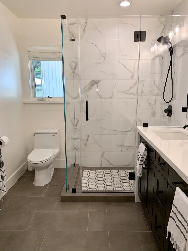 Mid-sized transitional kids' white tile and porcelain tile porcelain tile, gray floor and double-sink doorless shower photo in San Francisco with shaker cabinets, dark wood cabinets, a one-piece toilet, white walls, an undermount sink, quartz countertops, a hinged shower door, white countertops, a niche and a built-in vanity