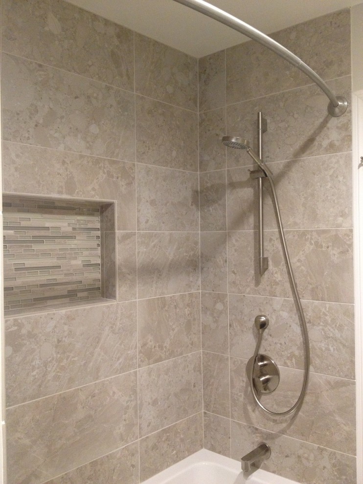 Mid-sized transitional gray tile and porcelain tile porcelain tile bathroom photo in Los Angeles with an undermount sink, shaker cabinets, dark wood cabinets, quartz countertops, a one-piece toilet and gray walls