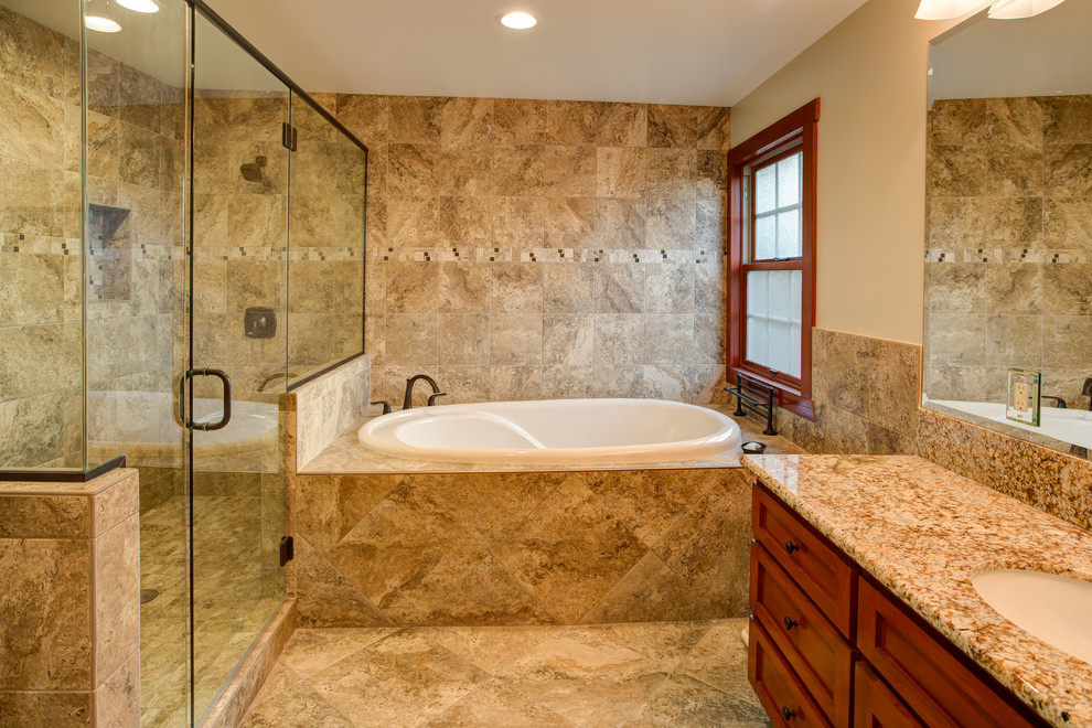 Inspiration for a craftsman master alcove shower remodel in Los Angeles with shaker cabinets, medium tone wood cabinets, a hot tub, beige walls, an undermount sink and granite countertops