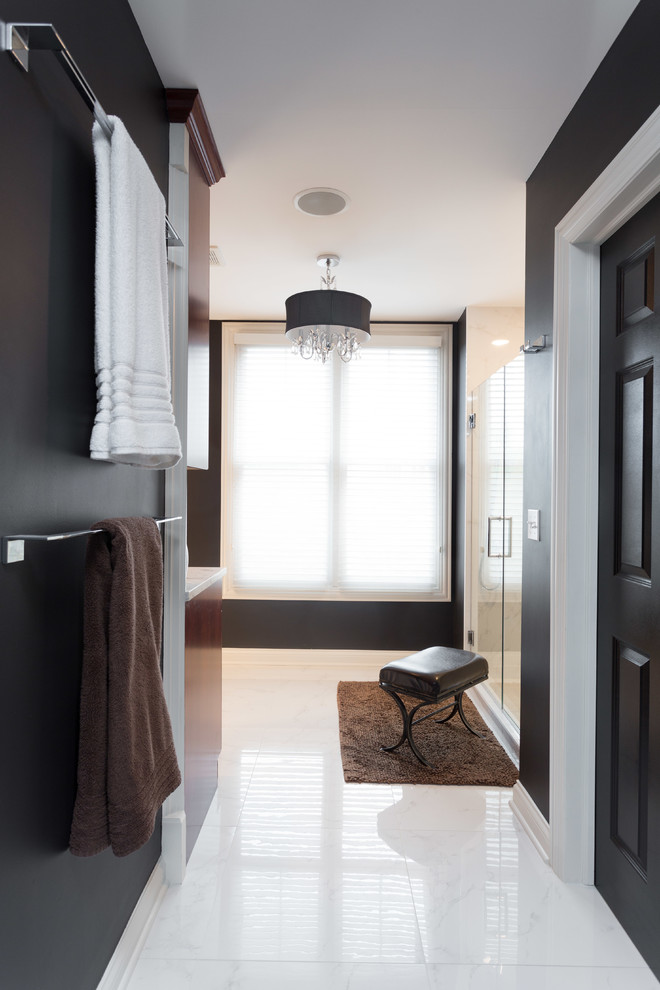Medium sized classic ensuite bathroom in Chicago with beaded cabinets, medium wood cabinets, a built-in bath, an alcove shower, a one-piece toilet, black and white tiles, porcelain tiles, black walls, marble flooring, a submerged sink and marble worktops.