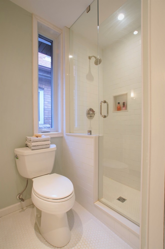 Large traditional ensuite bathroom in Toronto with shaker cabinets, white cabinets, an alcove shower, a two-piece toilet, white tiles, metro tiles, grey walls, mosaic tile flooring, a submerged sink, marble worktops, white floors and a hinged door.
