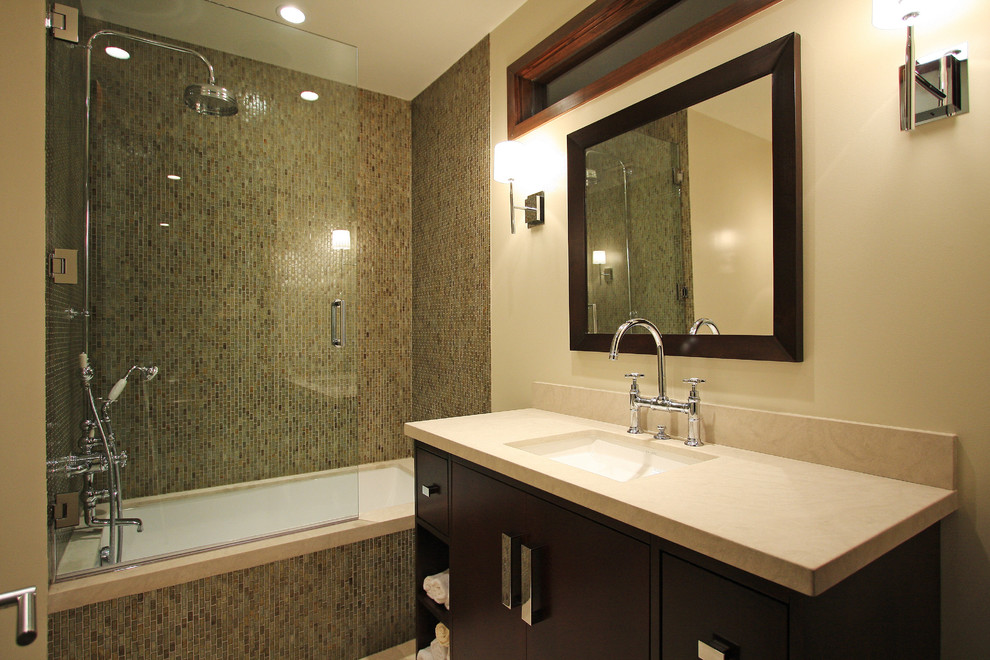 This is an example of a contemporary bathroom in Los Angeles with mosaic tiles and feature lighting.