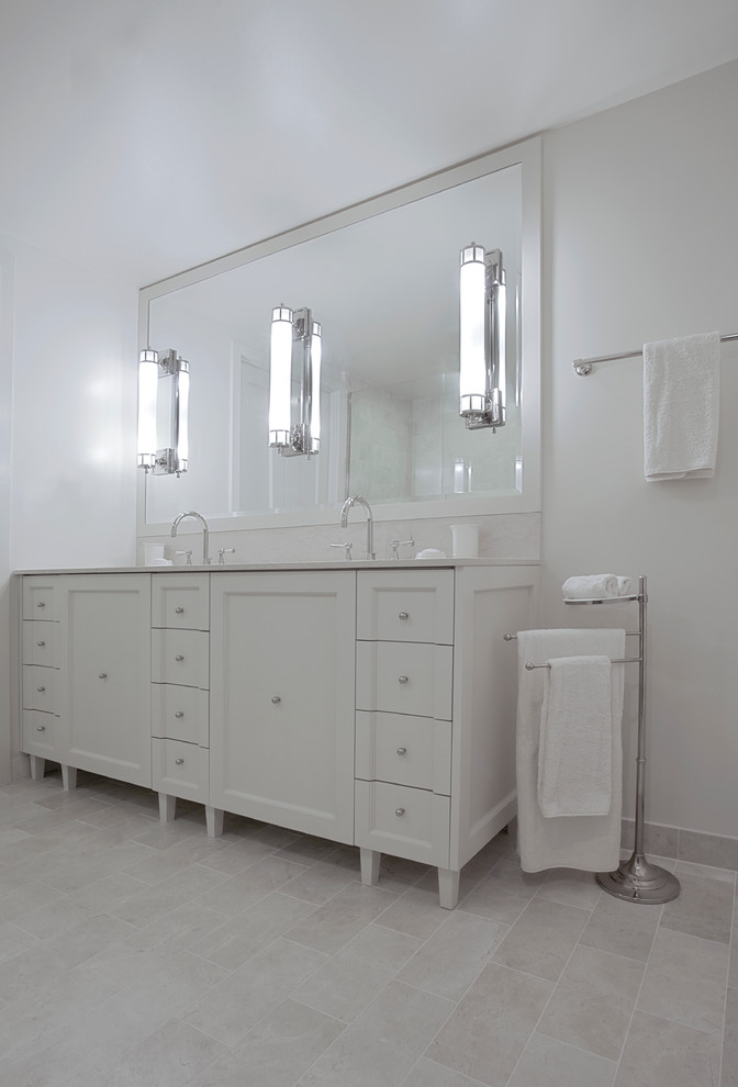 Inspiration for a large timeless master bathroom remodel in Chicago with beaded inset cabinets, white cabinets, white walls and an undermount sink