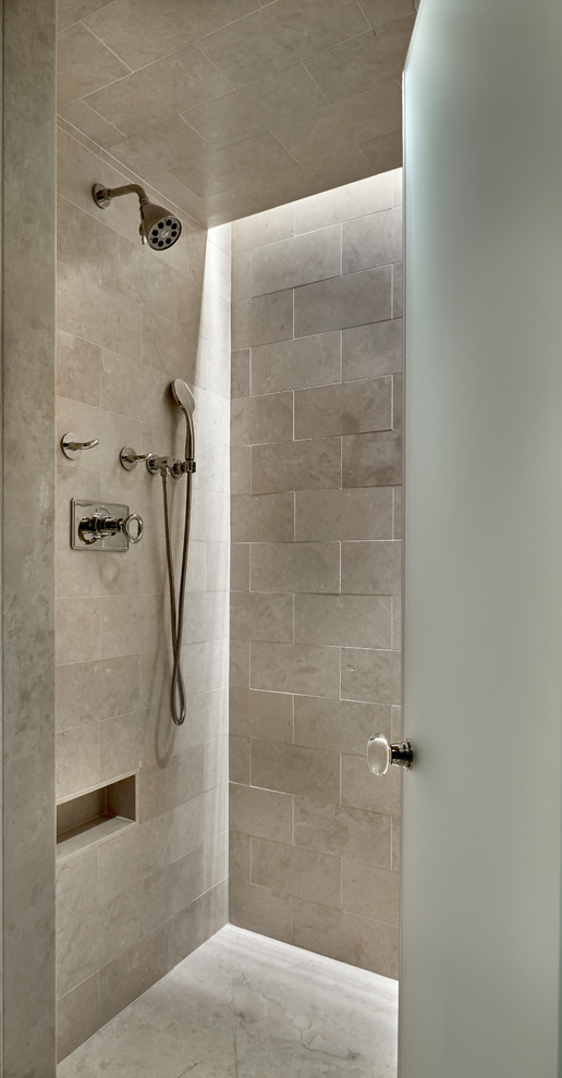Mid-sized trendy master beige tile and limestone tile ceramic tile and beige floor alcove shower photo in Chicago with beige walls and a hinged shower door