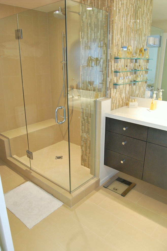 This is an example of a medium sized modern shower room bathroom in Los Angeles with flat-panel cabinets, dark wood cabinets, a corner shower, a one-piece toilet, beige tiles, mosaic tiles, white walls, porcelain flooring, a submerged sink and quartz worktops.