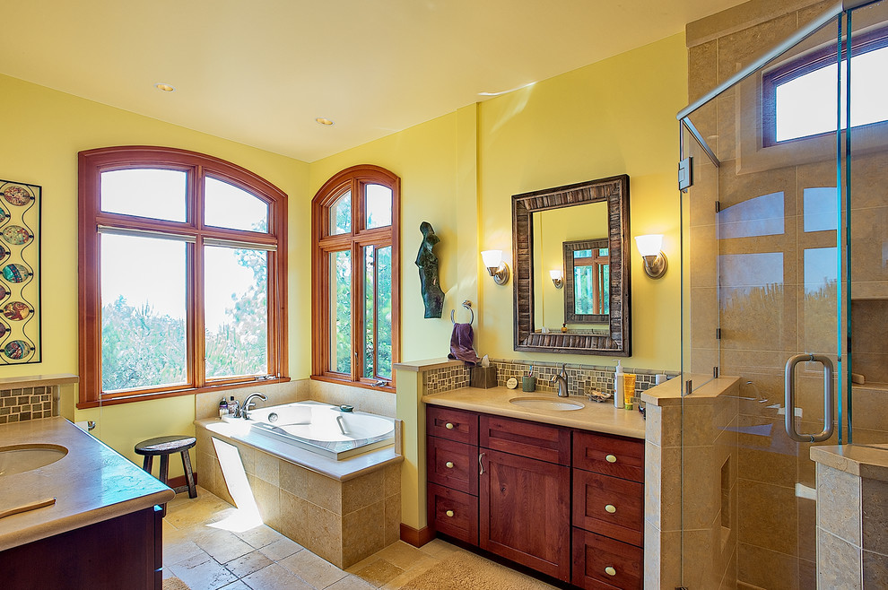 Bathroom - mid-sized eclectic master green tile and mosaic tile porcelain tile and beige floor bathroom idea in San Francisco with shaker cabinets, dark wood cabinets, yellow walls, an undermount sink, a one-piece toilet, marble countertops and a hinged shower door