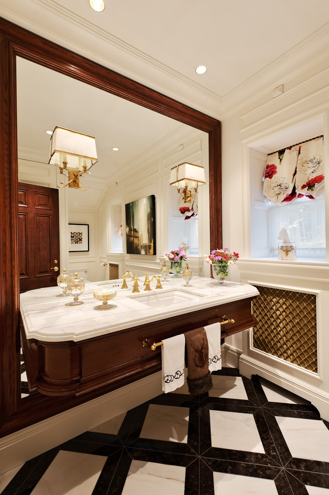 Bathroom - traditional white tile bathroom idea in Montreal with an undermount sink and dark wood cabinets
