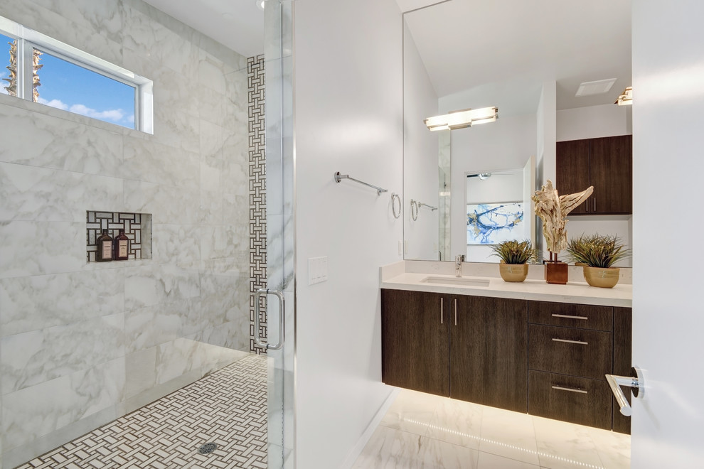 Example of a mid-sized minimalist master white tile and mosaic tile marble floor wet room design in Other with flat-panel cabinets, dark wood cabinets, a two-piece toilet, white walls, an undermount sink and quartz countertops