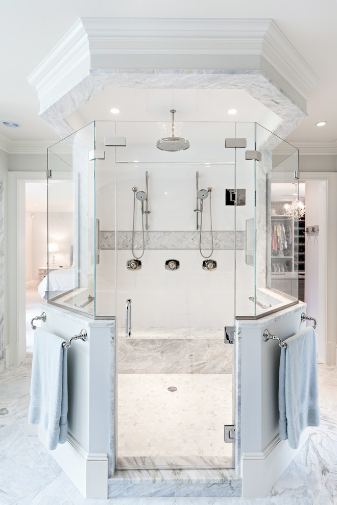 Inspiration for a huge eclectic master gray tile marble floor and gray floor bathroom remodel in Boston with raised-panel cabinets, gray cabinets, gray walls, a drop-in sink, marble countertops and a hinged shower door