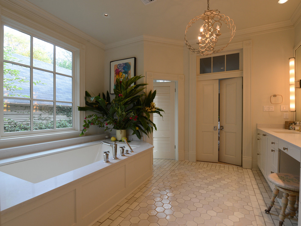 Large classic ensuite bathroom in New Orleans with white cabinets, a submerged bath, mosaic tile flooring, shaker cabinets, an alcove shower, beige tiles, grey tiles, white tiles, mosaic tiles, white walls, a submerged sink and engineered stone worktops.