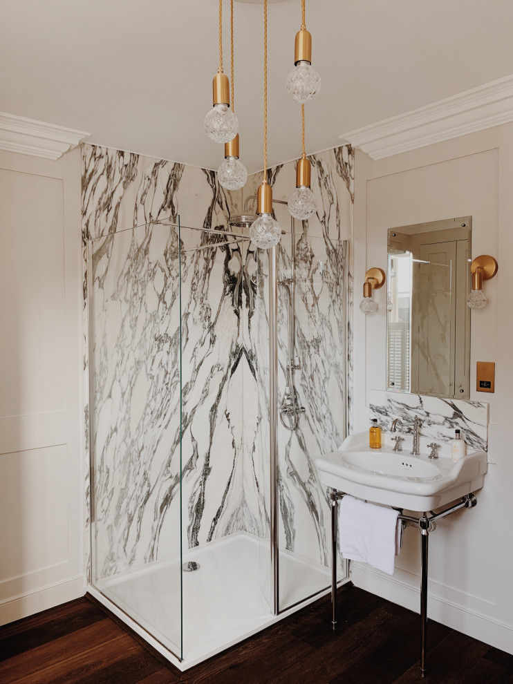 Bathroom - mid-sized transitional kids' gray tile and marble tile light wood floor and brown floor bathroom idea in Kent with shaker cabinets, beige cabinets, a two-piece toilet, beige walls, a pedestal sink, marble countertops and gray countertops