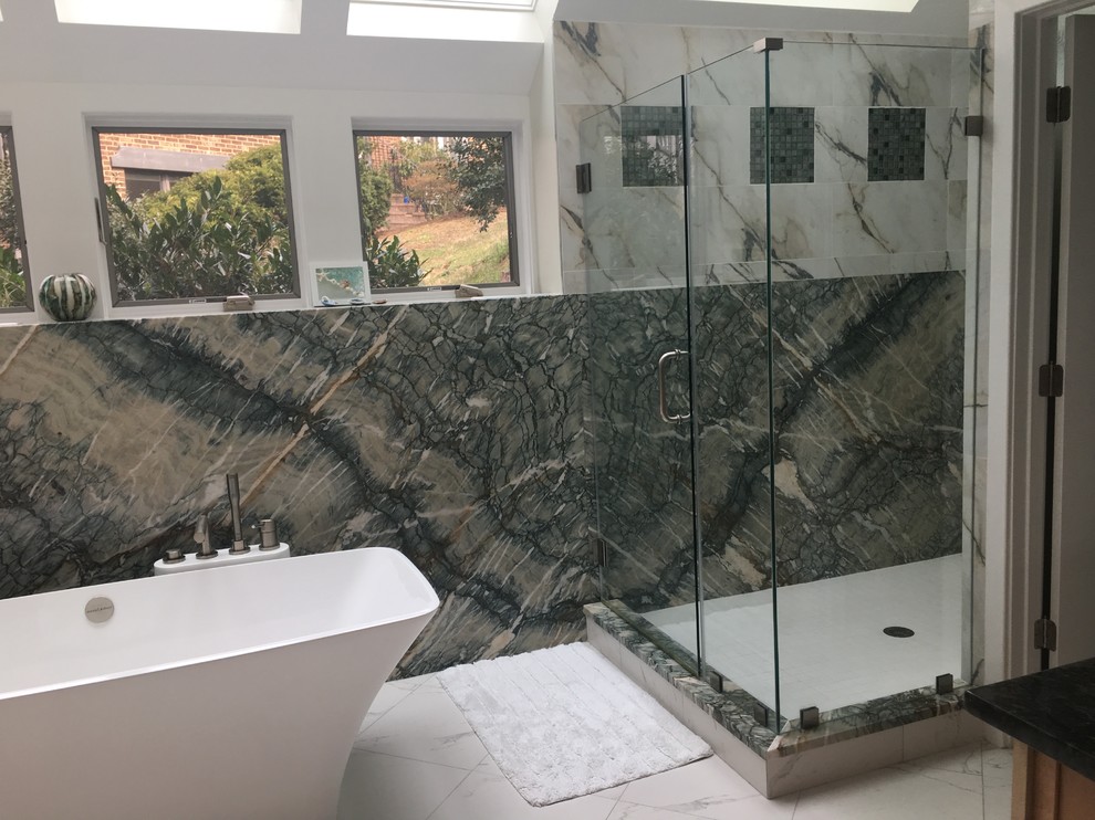 Inspiration for a mid-sized contemporary master multicolored tile and stone slab marble floor and white floor bathroom remodel in DC Metro with flat-panel cabinets, light wood cabinets, a two-piece toilet, white walls, an undermount sink, granite countertops and a hinged shower door