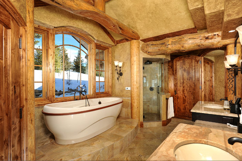 large bathroom in a cabin with a standalone tub