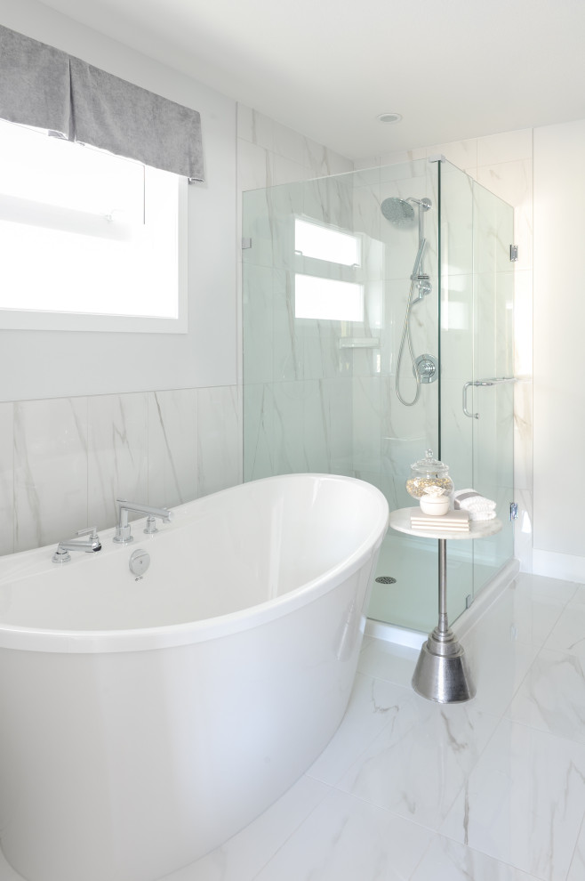 Medium sized classic ensuite bathroom in Vancouver with recessed-panel cabinets, a freestanding bath, a corner shower, a one-piece toilet, porcelain tiles, multi-coloured walls, ceramic flooring, a submerged sink, engineered stone worktops, multi-coloured floors, a hinged door, double sinks and a built in vanity unit.