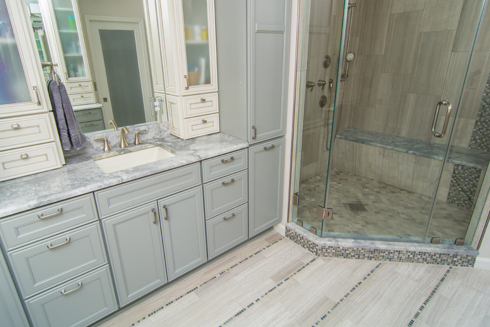 This is an example of a medium sized contemporary bathroom in DC Metro with a submerged sink, grey cabinets, quartz worktops, an alcove bath, an alcove shower, grey tiles, grey walls and ceramic flooring.