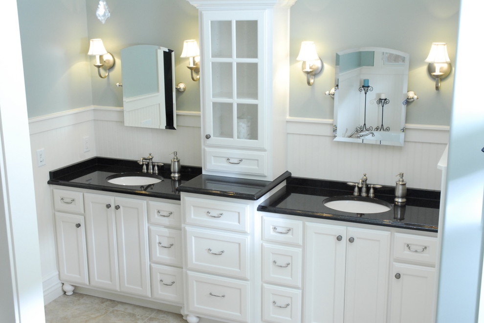 Design ideas for a medium sized classic bathroom in Other with a built-in sink, recessed-panel cabinets, white cabinets, granite worktops and blue walls.