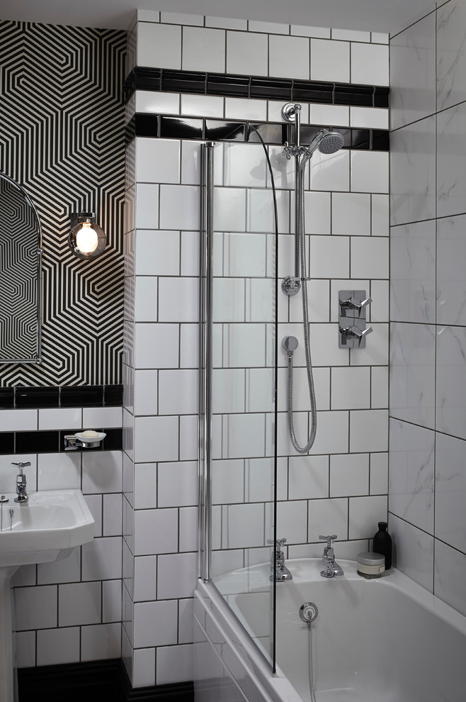 Contemporary bathroom in West Midlands with white tiles.