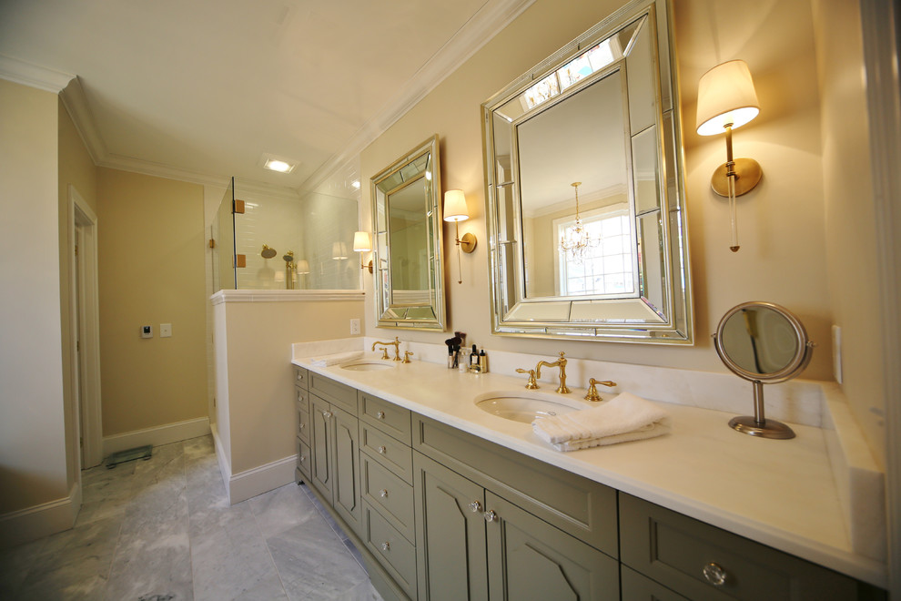Bathroom - mid-sized eclectic master white tile and ceramic tile marble floor bathroom idea in Other with furniture-like cabinets, green cabinets, a two-piece toilet, beige walls and an undermount sink